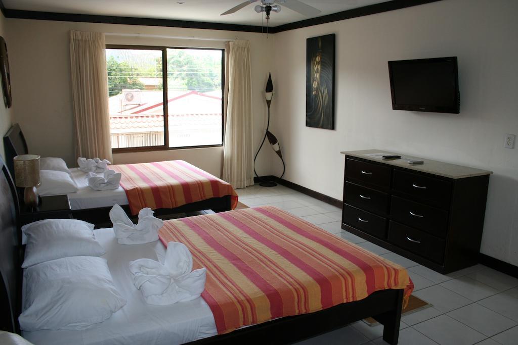 Tuanis Aparthotel Jacó Quarto foto