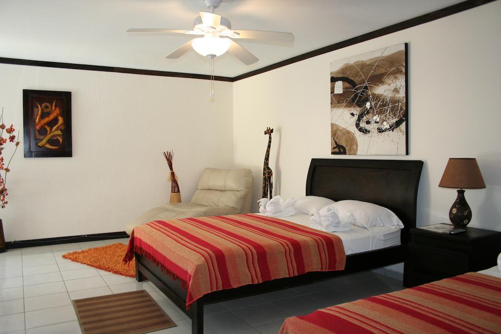 Tuanis Aparthotel Jacó Quarto foto