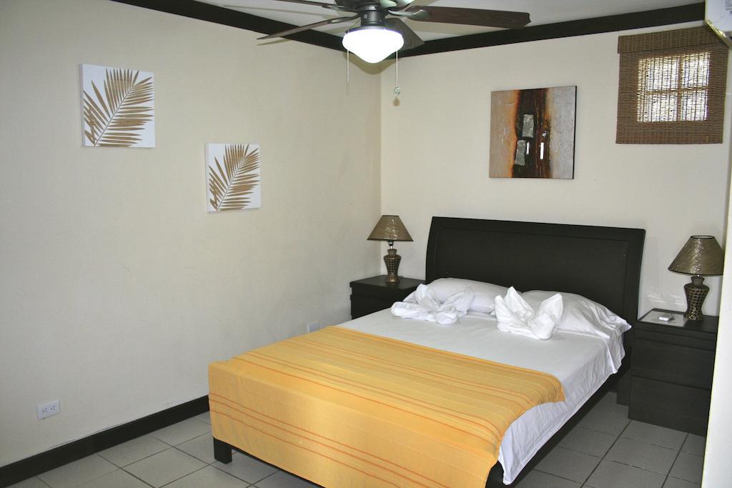 Tuanis Aparthotel Jacó Quarto foto