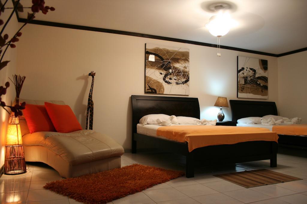 Tuanis Aparthotel Jacó Quarto foto